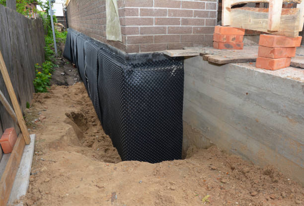 Happy homeowners after waterproofing job in Lutherville Timonium